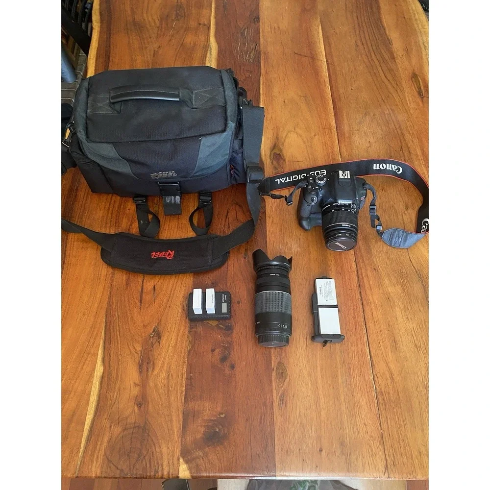 Canon EOS Rebel T3I 18 MP Digital SLR Camera with two Lenses, Charger And Bag